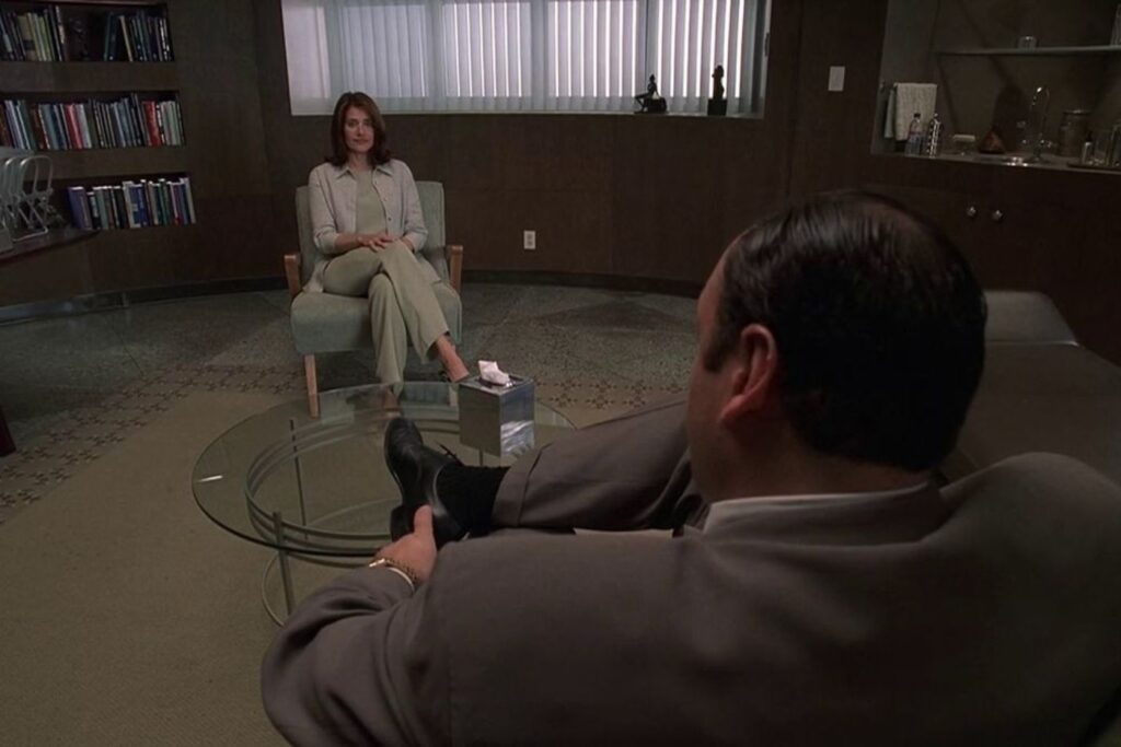 Man and woman talking in therapy session