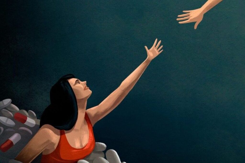 Woman reaching for help amid pills
